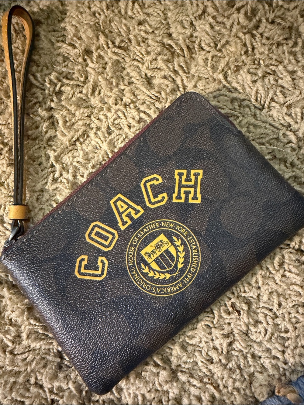COACH Men's Brown Leather Wristlet Pouch with Yellow Logo